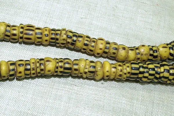 Strand of Yellow with Black Stripes Eja (Aja) Beads
