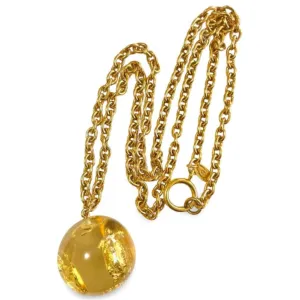 Vintage CHANEL long chain necklace with resin ball top, CC mark, turtle, camellia, clover, and 2.55 bag motifs in it. 060312ac4